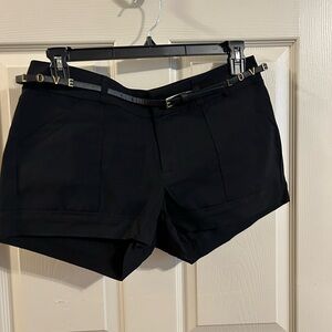 Black Jean shorts with a Love belt